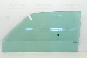 Green tinted front left window