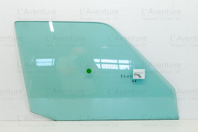 Green tinted front right window